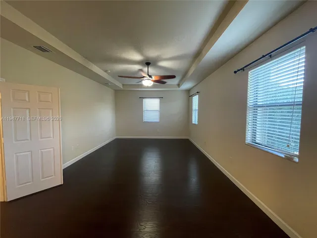 a bathroom with a tub and a shower