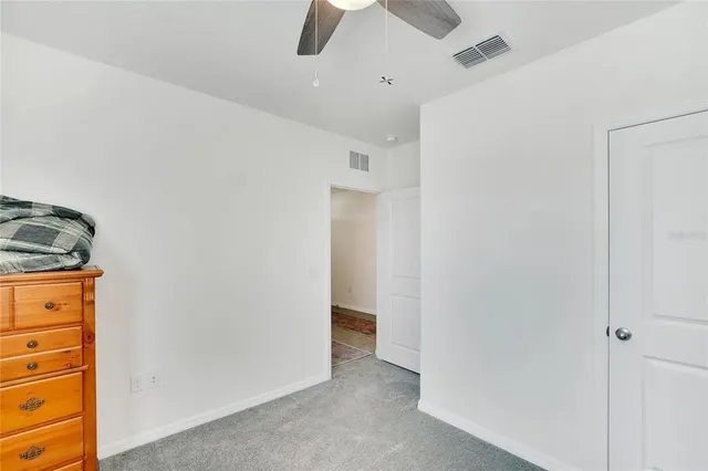 a kitchen with stainless steel appliances kitchen island granite countertop a sink and cabinets