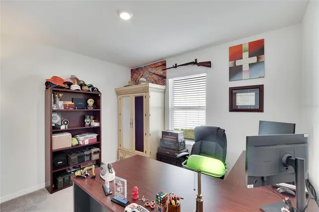 a kitchen with stainless steel appliances granite countertop a stove and a microwave