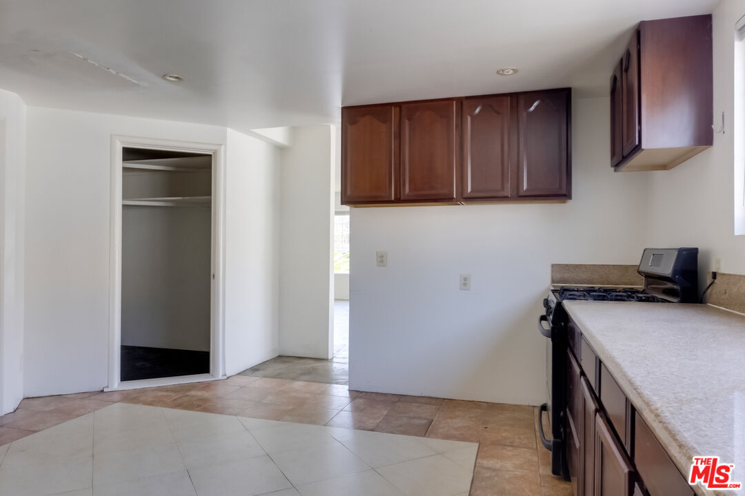 4336 Alla Road Los Angeles, CA 90066 - Photo 14 of 54 a view of a kitchen with cabinets and wooden floor