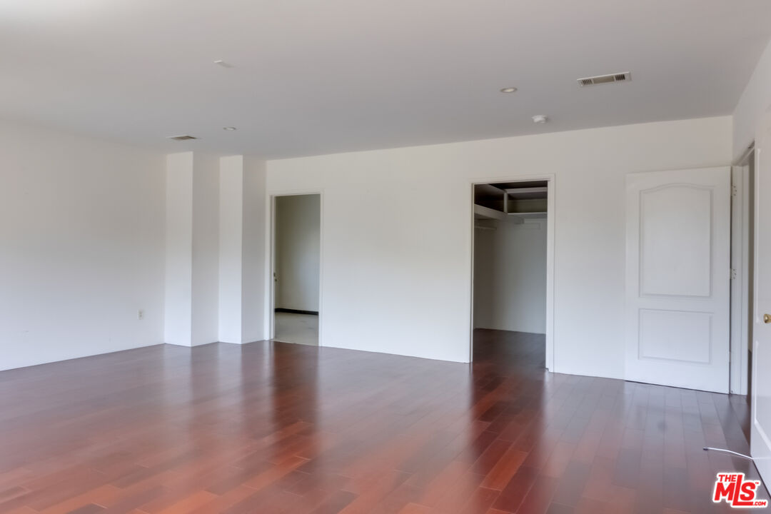 4336 Alla Road Los Angeles, CA 90066 - Photo 17 of 54 a view of an empty room with wooden floor and closet