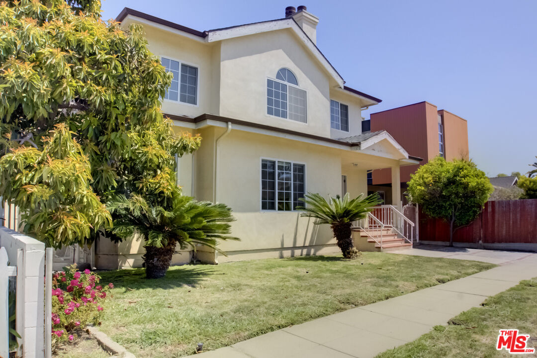 4336 Alla Road Los Angeles, CA 90066 - Photo 2 of 54 a front view of a house with garden