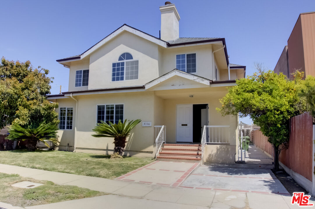 4336 Alla Road Los Angeles, CA 90066 - Photo 3 of 54 a front view of a house with garden