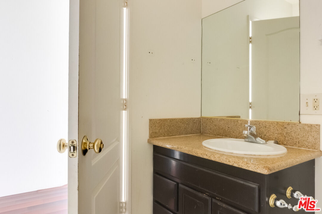 4336 Alla Road Los Angeles, CA 90066 - Photo 34 of 54 a bathroom with a sink and a mirror