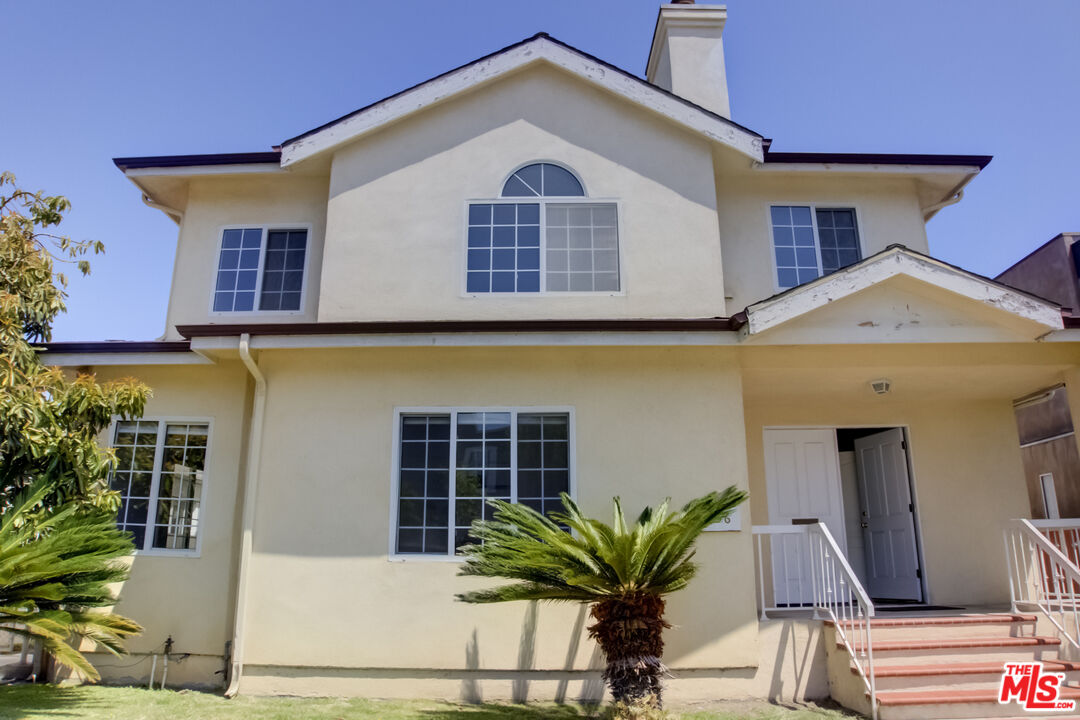 4336 Alla Road Los Angeles, CA 90066 - Photo 4 of 54 a front view of a house with a yard