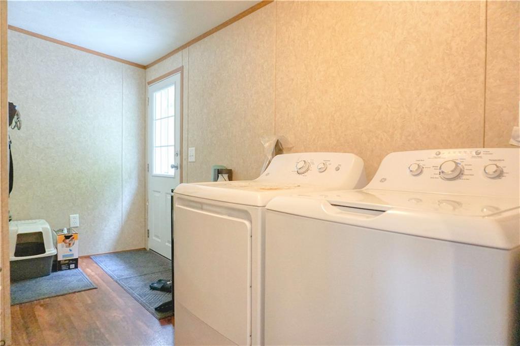 218 Rustic Ridge Lane Butler, PA 16002 - Photo 19 of 19 a utility room with dryer and washer