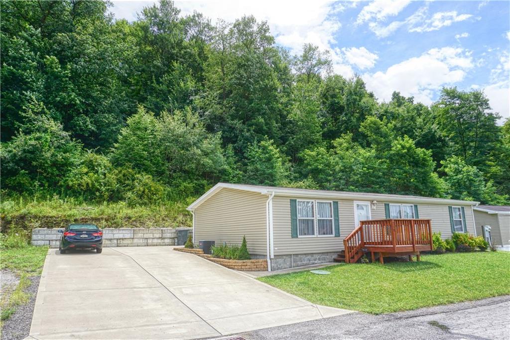 218 Rustic Ridge Lane Butler, PA 16002 - Photo 2 of 19 a view of a house with a garden