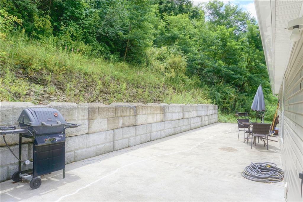 218 Rustic Ridge Lane Butler, PA 16002 - Photo 3 of 19 a backyard view with sitting space