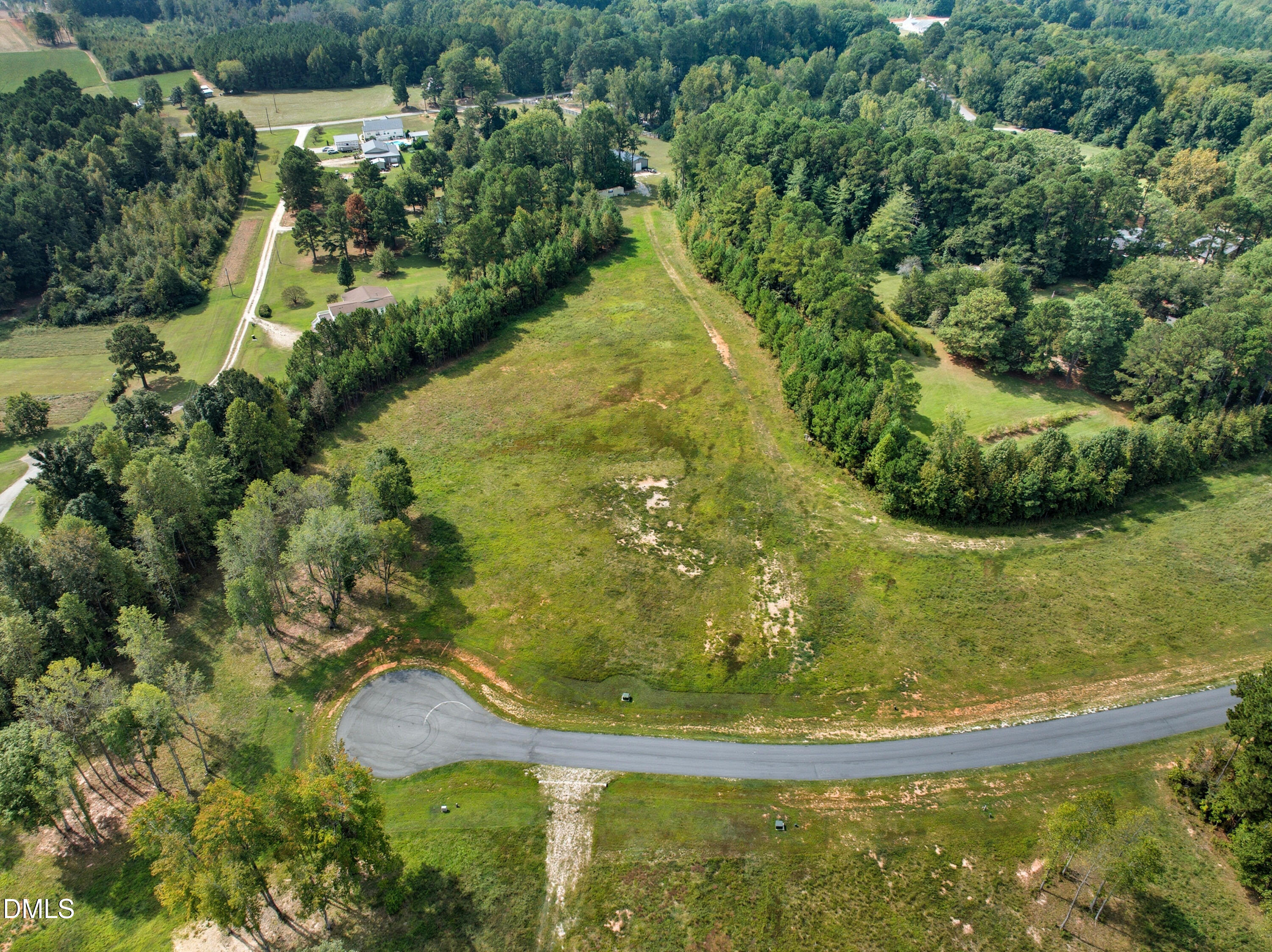 12217 Trey Point Dr Spring Spring Hope, NC 27882 - Photo 3 of 10 a view of a garden