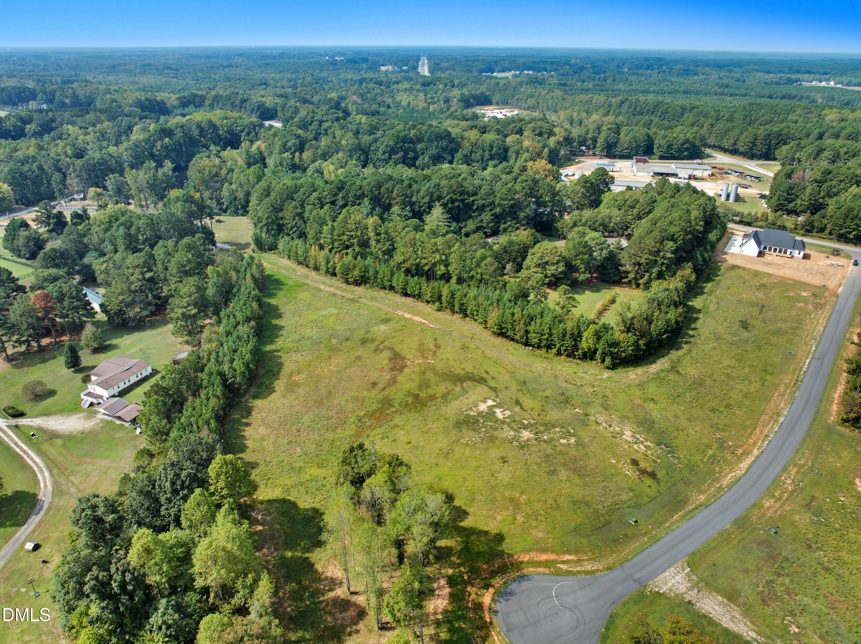 12217 Trey Point Dr Spring Spring Hope, NC 27882 - Photo 4 of 10 an aerial view of residential houses with outdoor space and trees