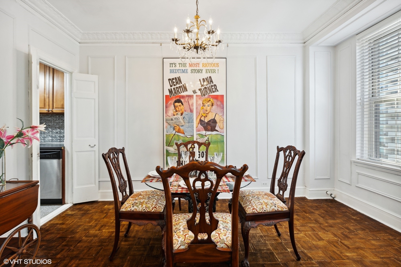 6101 North Sheridan Road, Unit 9D Chicago, IL 60660 - Photo 13 of 22 a view of a dining room with furniture window and wooden floor
