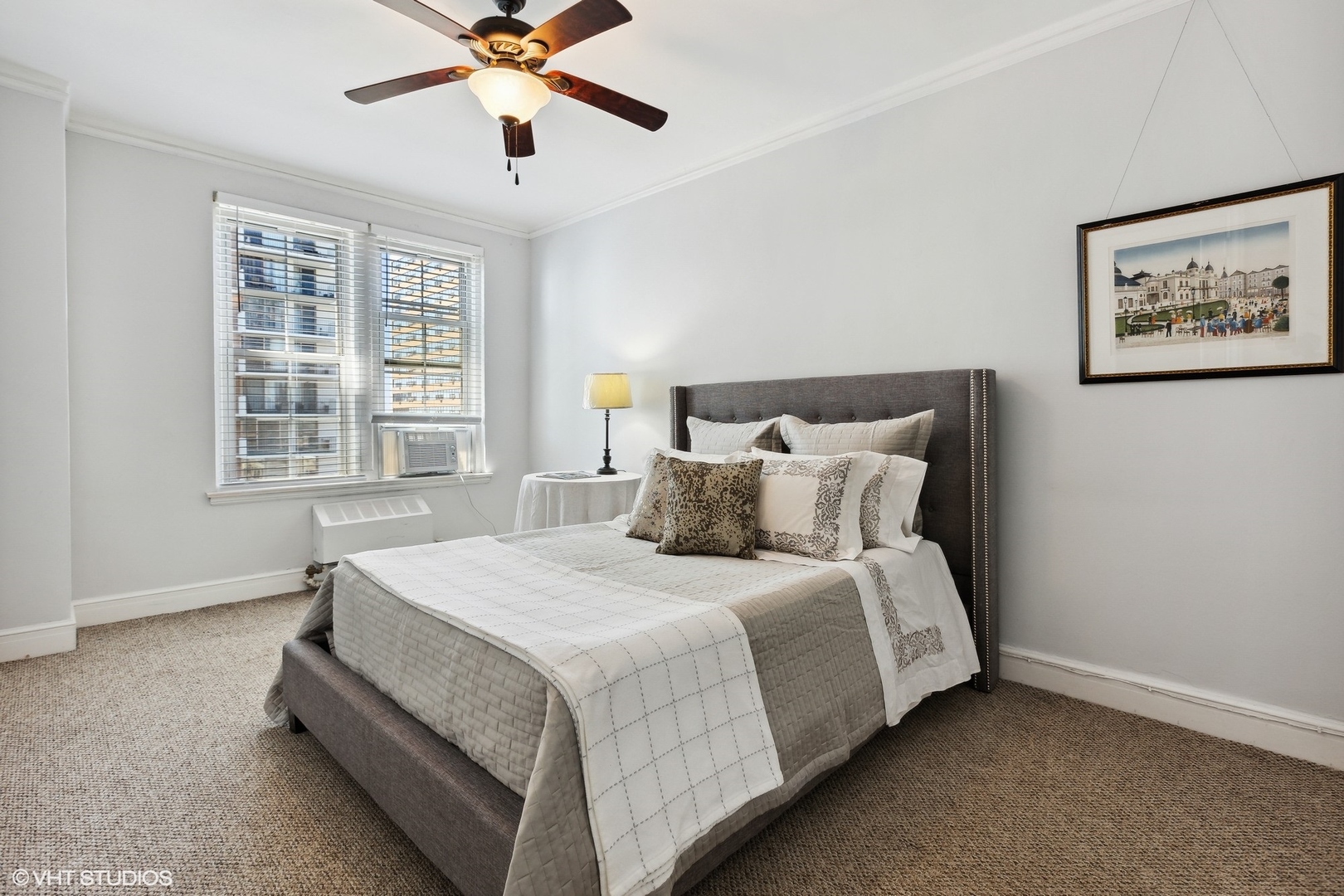 6101 North Sheridan Road, Unit 9D Chicago, IL 60660 - Photo 15 of 22 a bedroom with a bed and window
