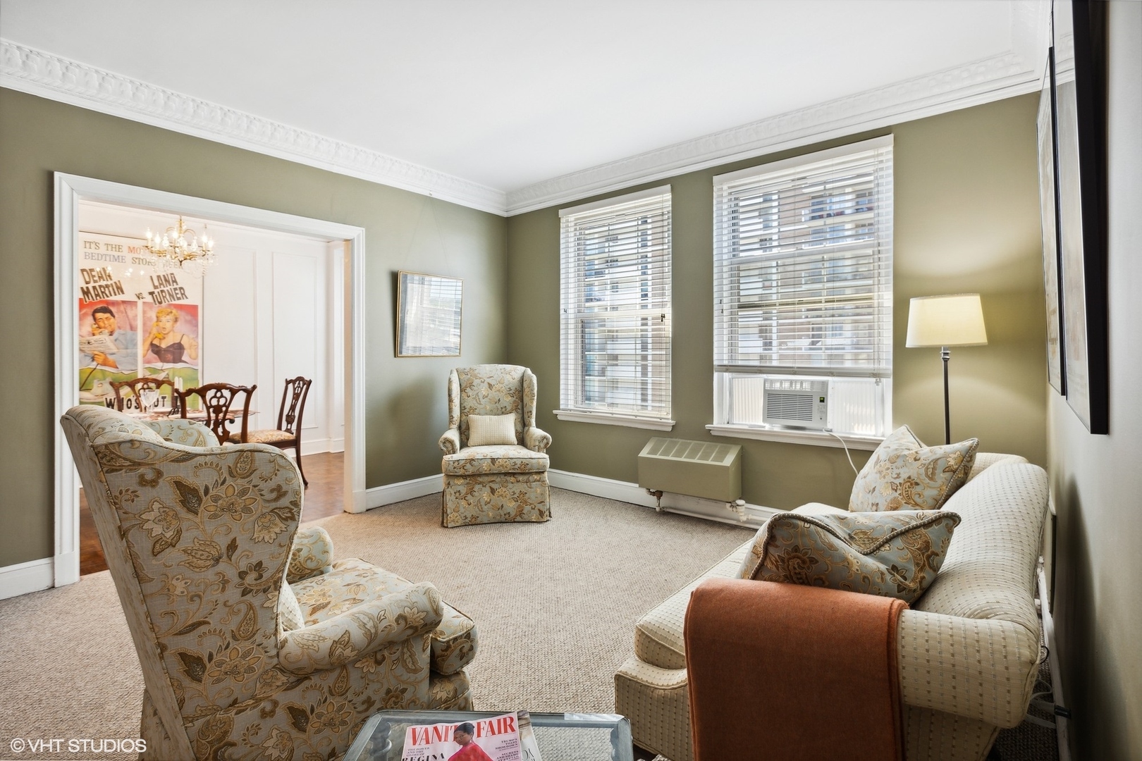 6101 North Sheridan Road, Unit 9D Chicago, IL 60660 - Photo 7 of 22 a living room with furniture and a large window
