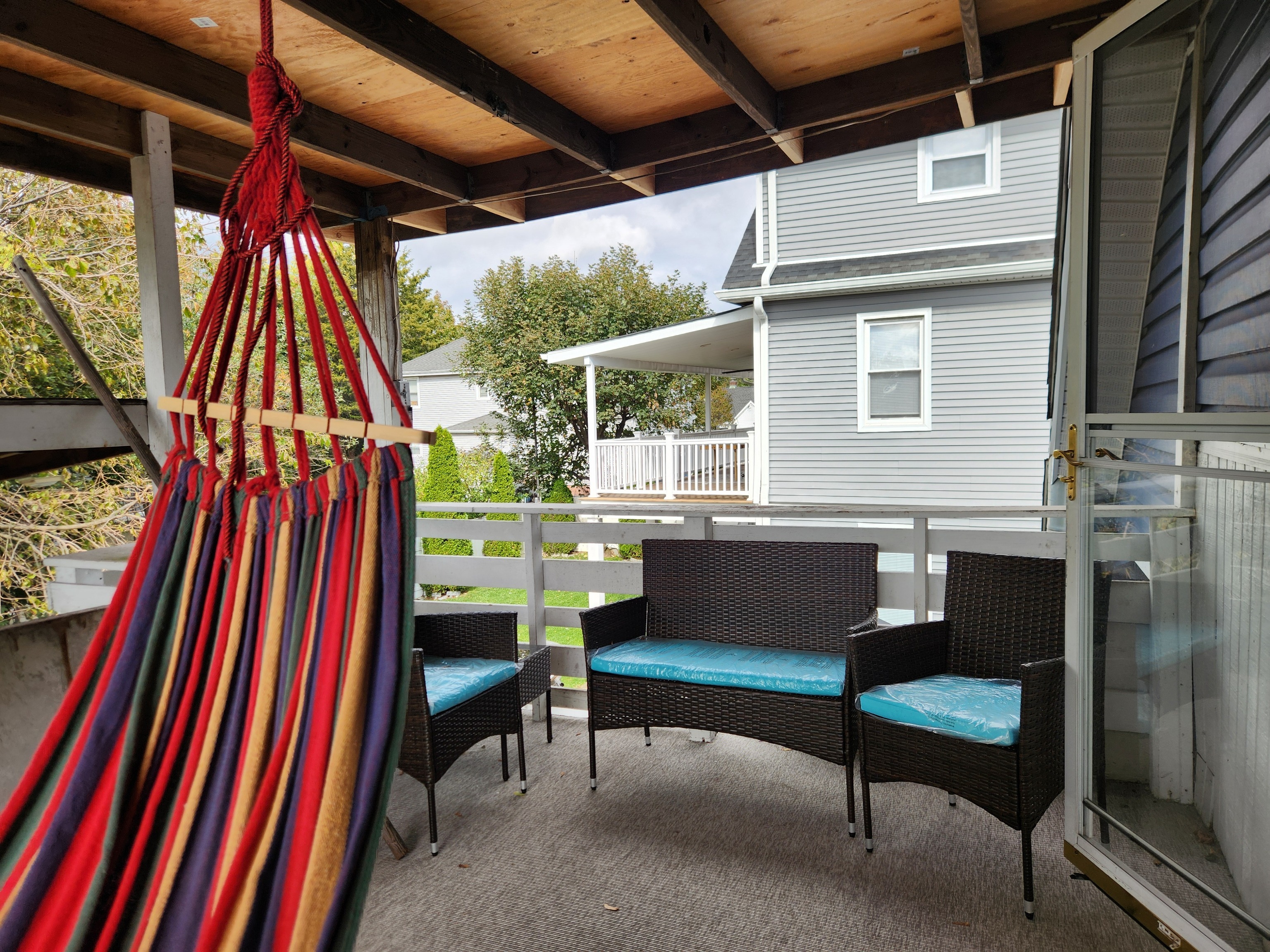 61 Aberdeen Street Stamford, CT 06902 - Photo 17 of 19 a backyard of a house with outdoor seating