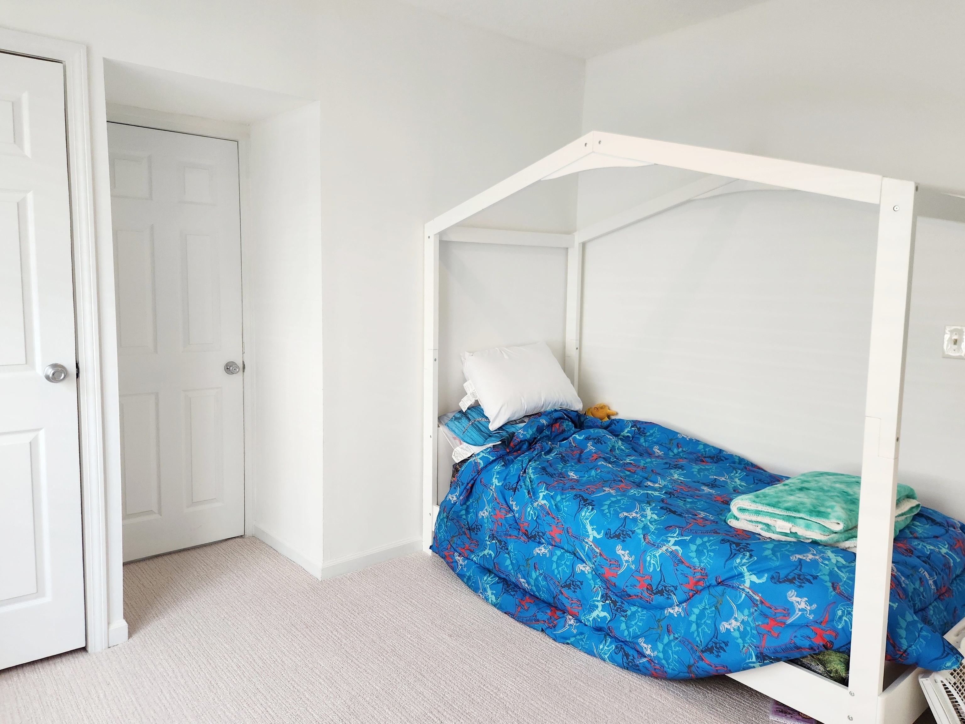 61 Aberdeen Street Stamford, CT 06902 - Photo 6 of 19 a bedroom with a bed and a painting on the wall