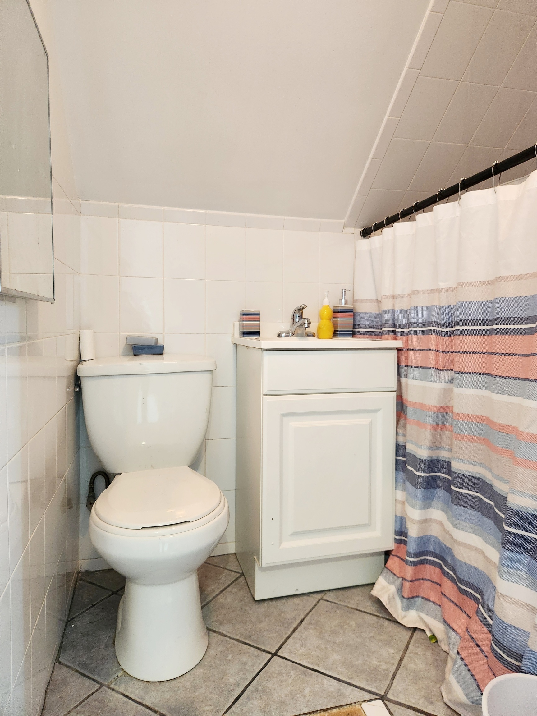 61 Aberdeen Street Stamford, CT 06902 - Photo 8 of 19 a bathroom with a toilet and a sink