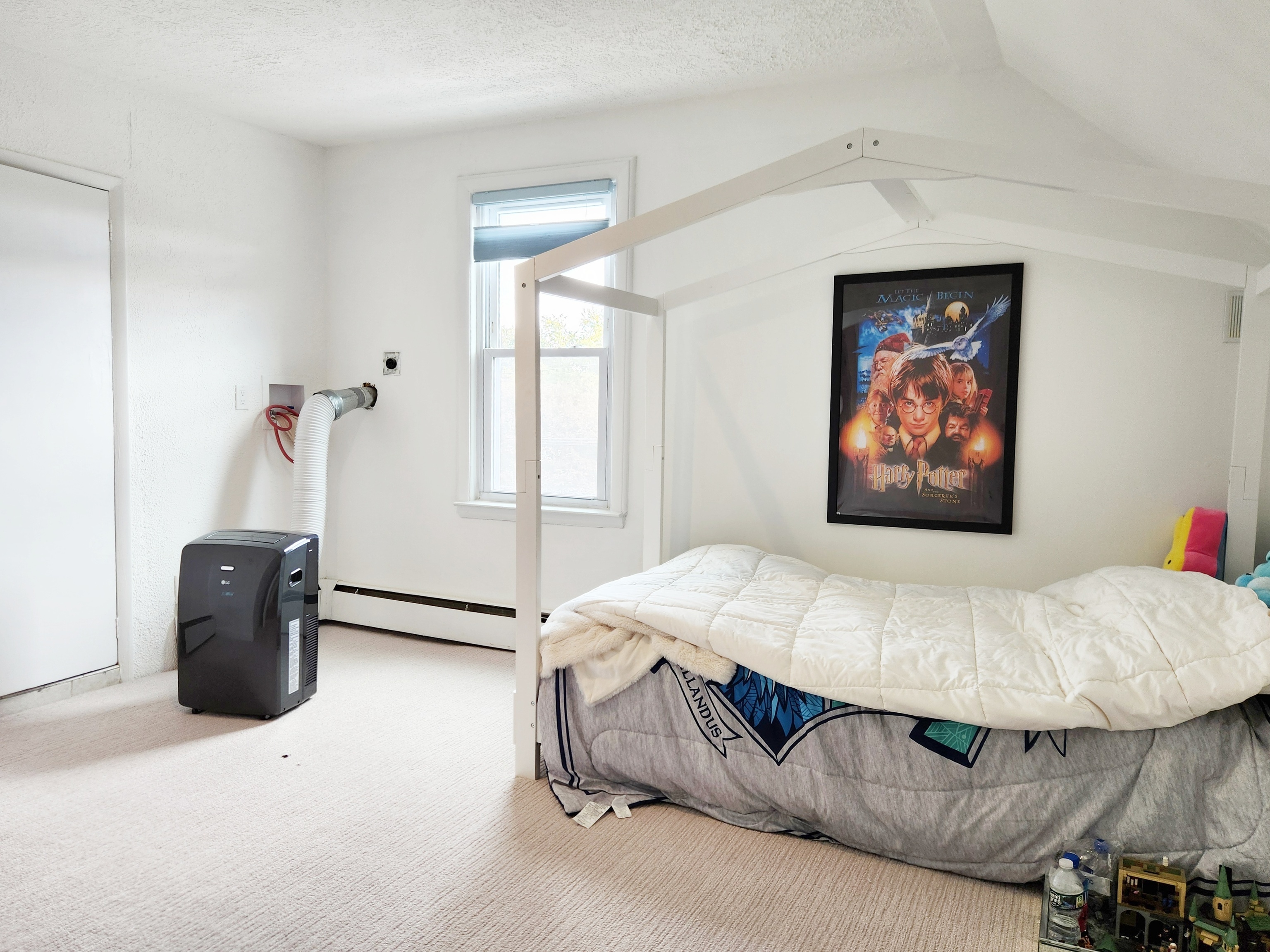 61 Aberdeen Street Stamford, CT 06902 - Photo 9 of 19 a bedroom with a bed and a painting on the wall