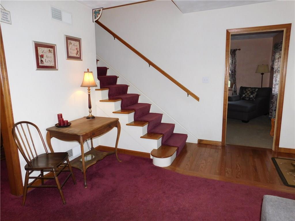 105 Spohn Road Freeport, PA 16229 - Photo 2 of 25 Leaded glass insulated entry door & woodwork flooring into formal living room