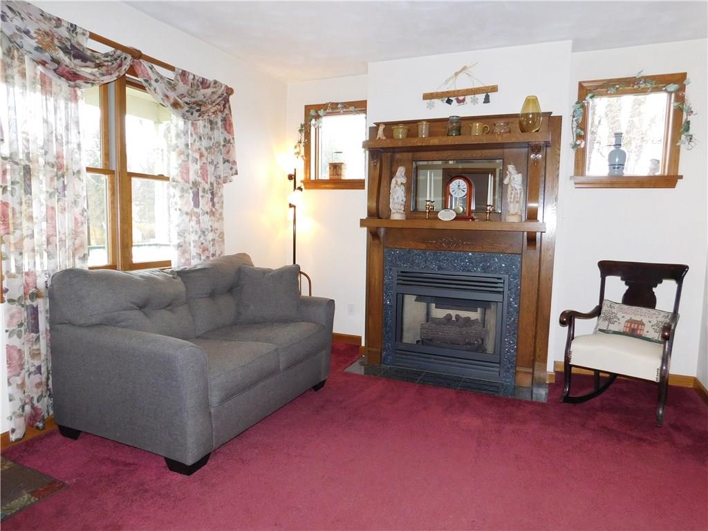 105 Spohn Road Freeport, PA 16229 - Photo 3 of 25 Formal living room with graceful turn of the century mantel & convenience of gas logs fireplace