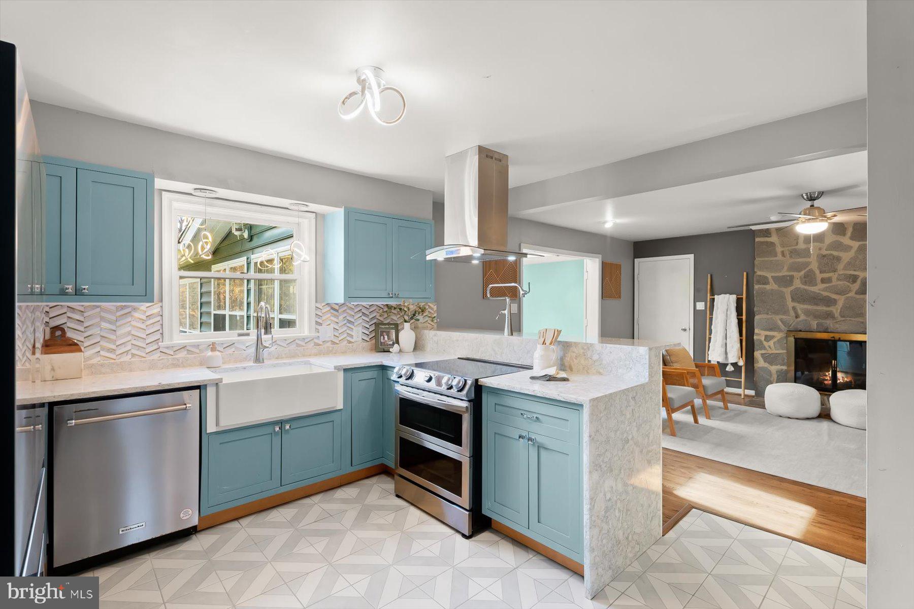 9600 Watkins Road Gaithersburg, MD 20882 - Photo 13 of 48 a kitchen with a sink stove and cabinets