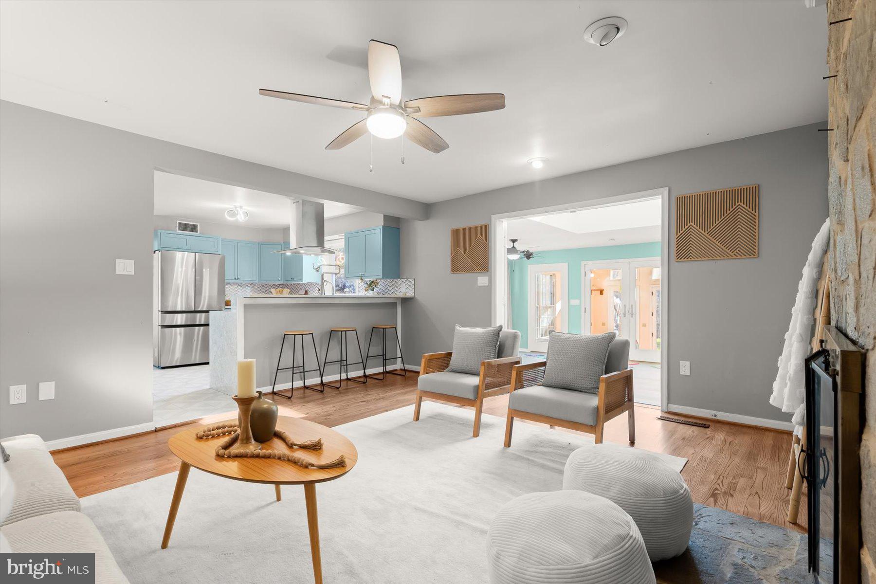 9600 Watkins Road Gaithersburg, MD 20882 - Photo 18 of 48 a living room with furniture and a wooden floor