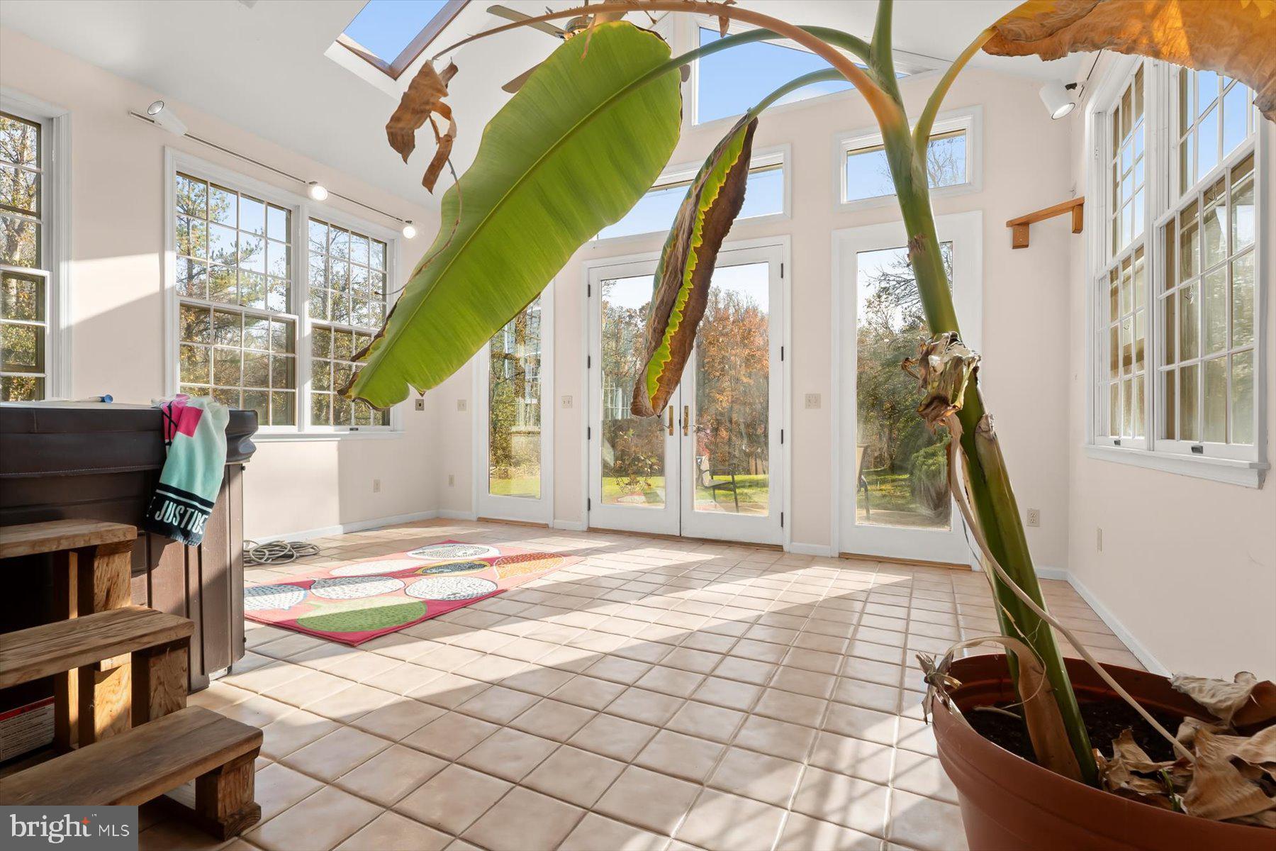 9600 Watkins Road Gaithersburg, MD 20882 - Photo 21 of 48 a room with lots of windows and white walls