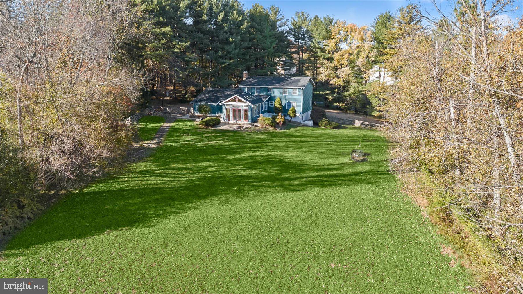 9600 Watkins Road Gaithersburg, MD 20882 - Photo 43 of 48 a view of a house with a big yard