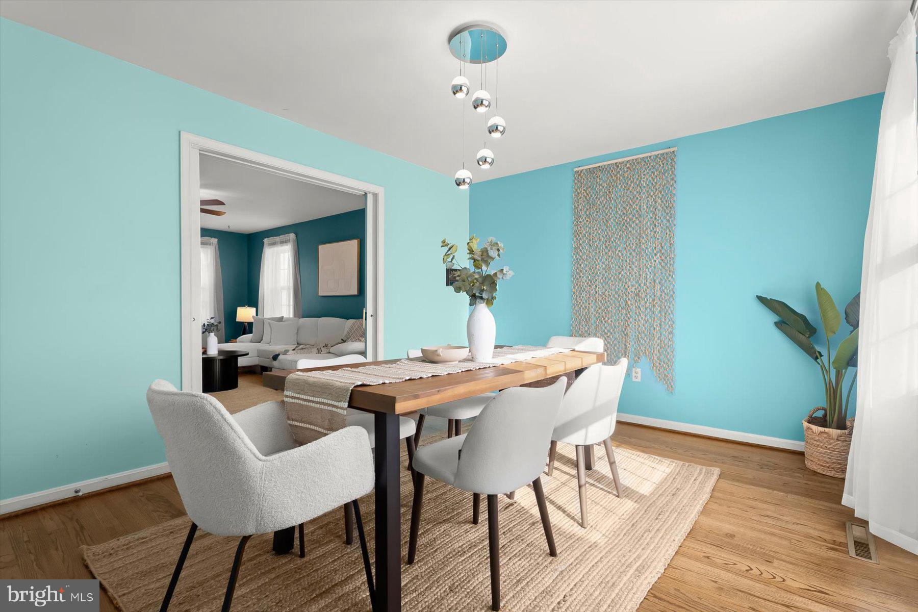 9600 Watkins Road Gaithersburg, MD 20882 - Photo 10 of 48 a view of a dining room with furniture window and wooden floor