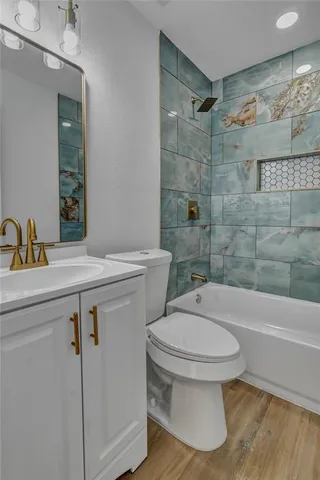 a bathroom with a shower and bathtub