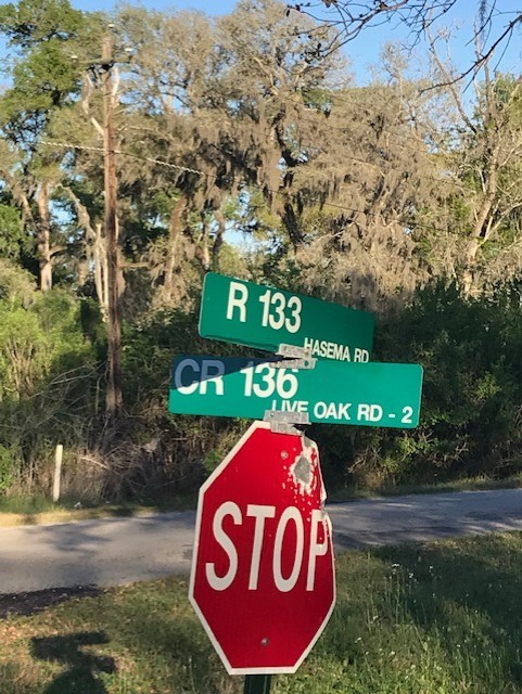 0 East Live Oak Road Van Vleck, TX 77482 - Photo 9 of 10 a sign board on a road