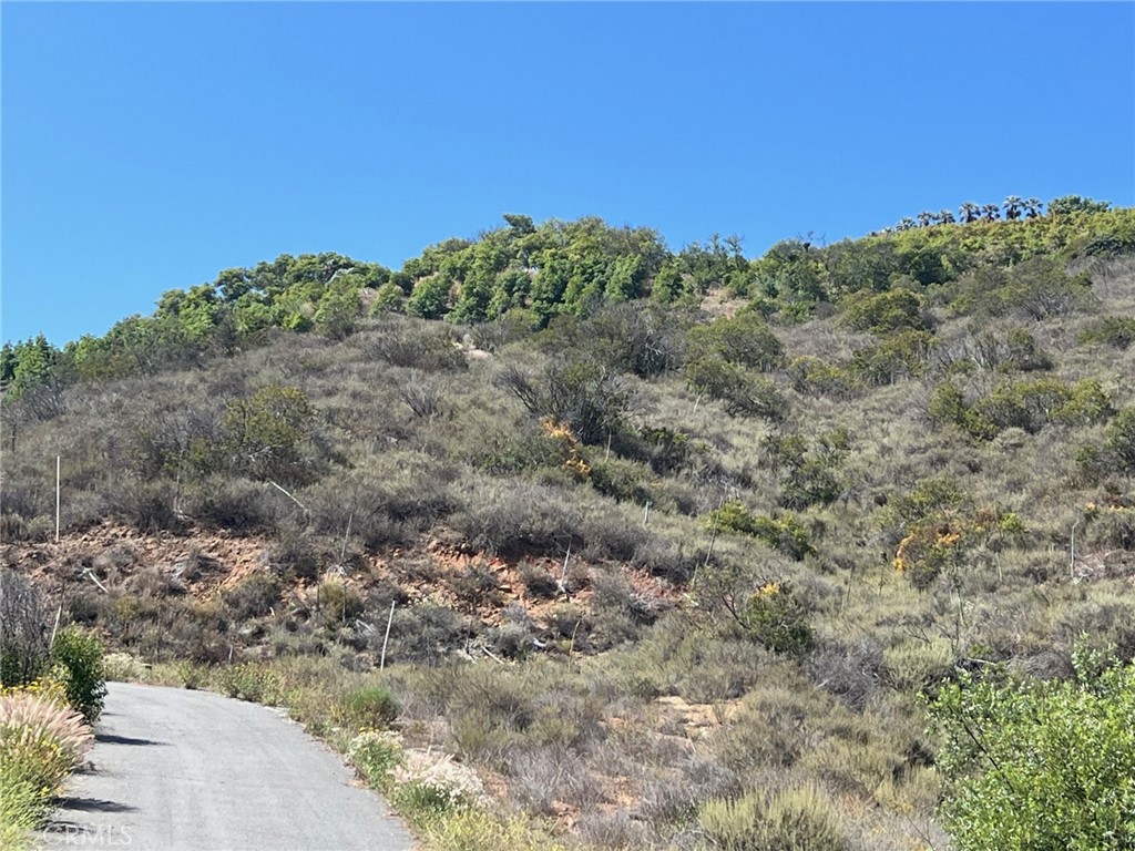16 Pampas Road Temecula, CA 92590 - Photo 2 of 4 a view of a large building with a field