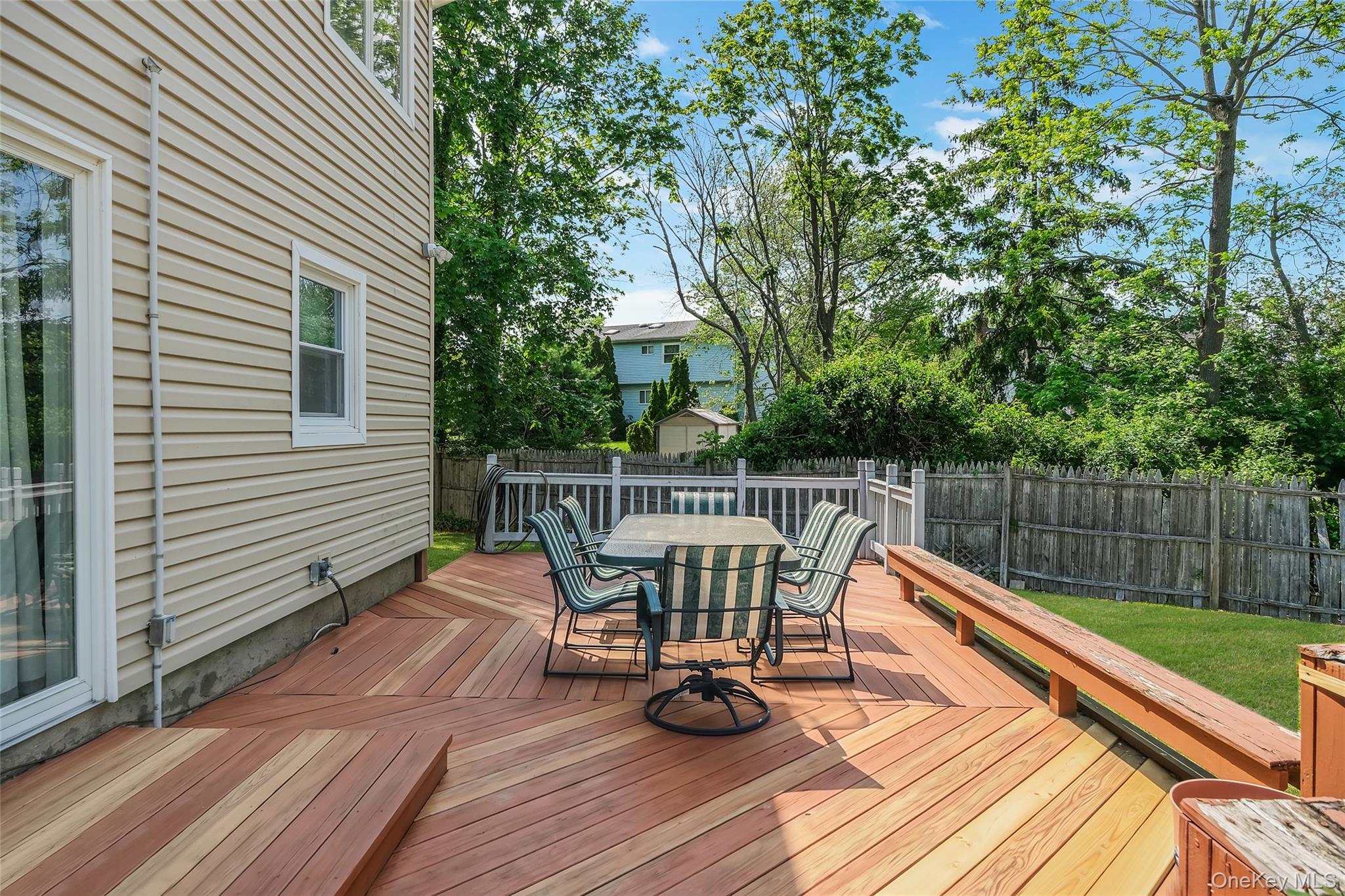 59 Maybrook Road North Babylon, NY 11703 - Photo 39 of 43 a view of sitting area with furniture and wooden floor