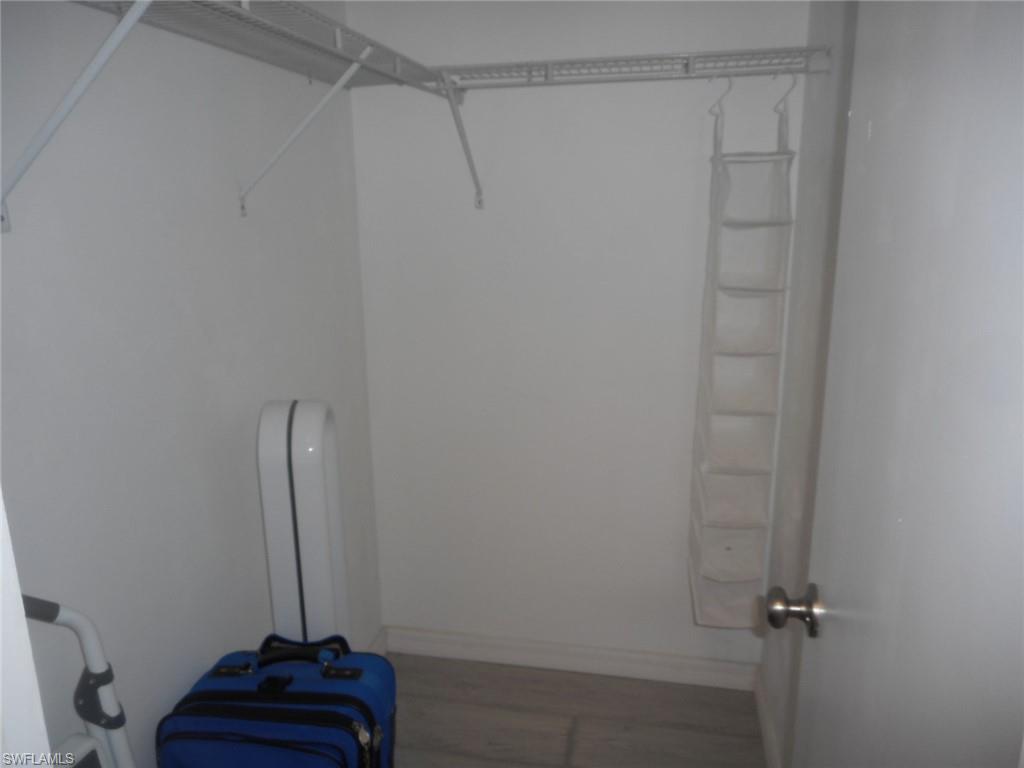 1007 Pine Isle Lane, Unit 1007 Naples, FL 34112 - Photo 11 of 22 a bathroom with a shower