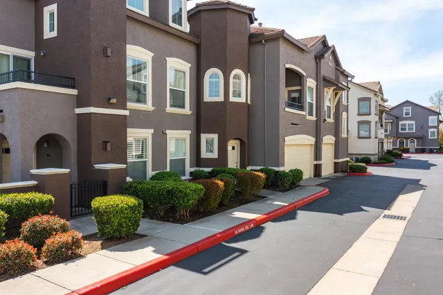 a front view of a multi story residential apartment building