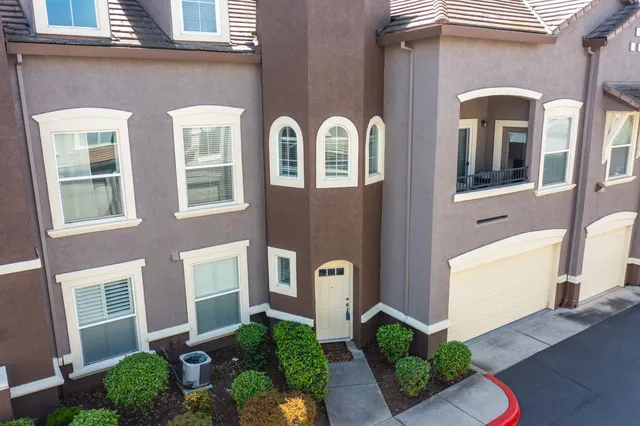 a front view of a multi story residential apartment building