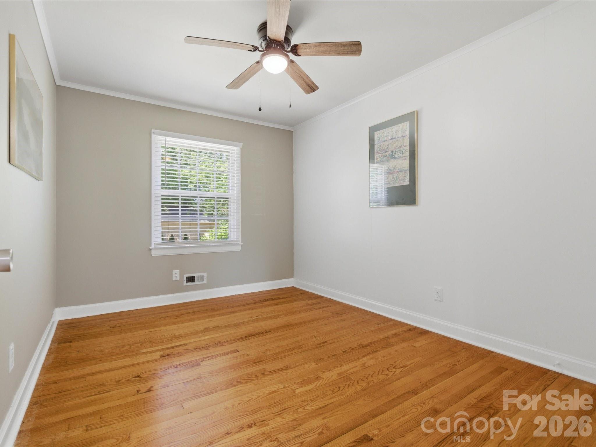 419 Knox Street Clover, SC 29710 - Photo 11 of 48 a view of an empty room with a window