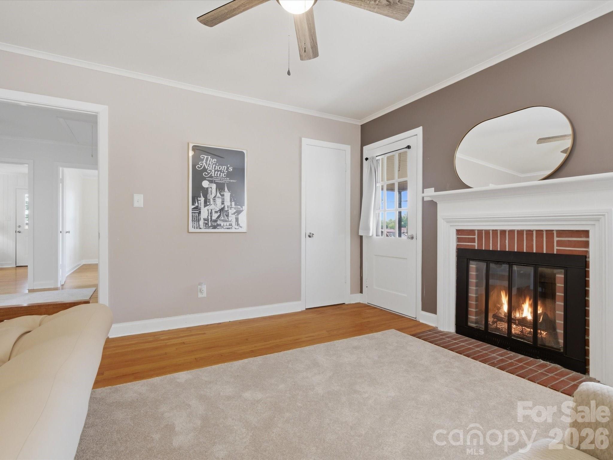 419 Knox Street Clover, SC 29710 - Photo 13 of 48 a bedroom with bed and a fireplace