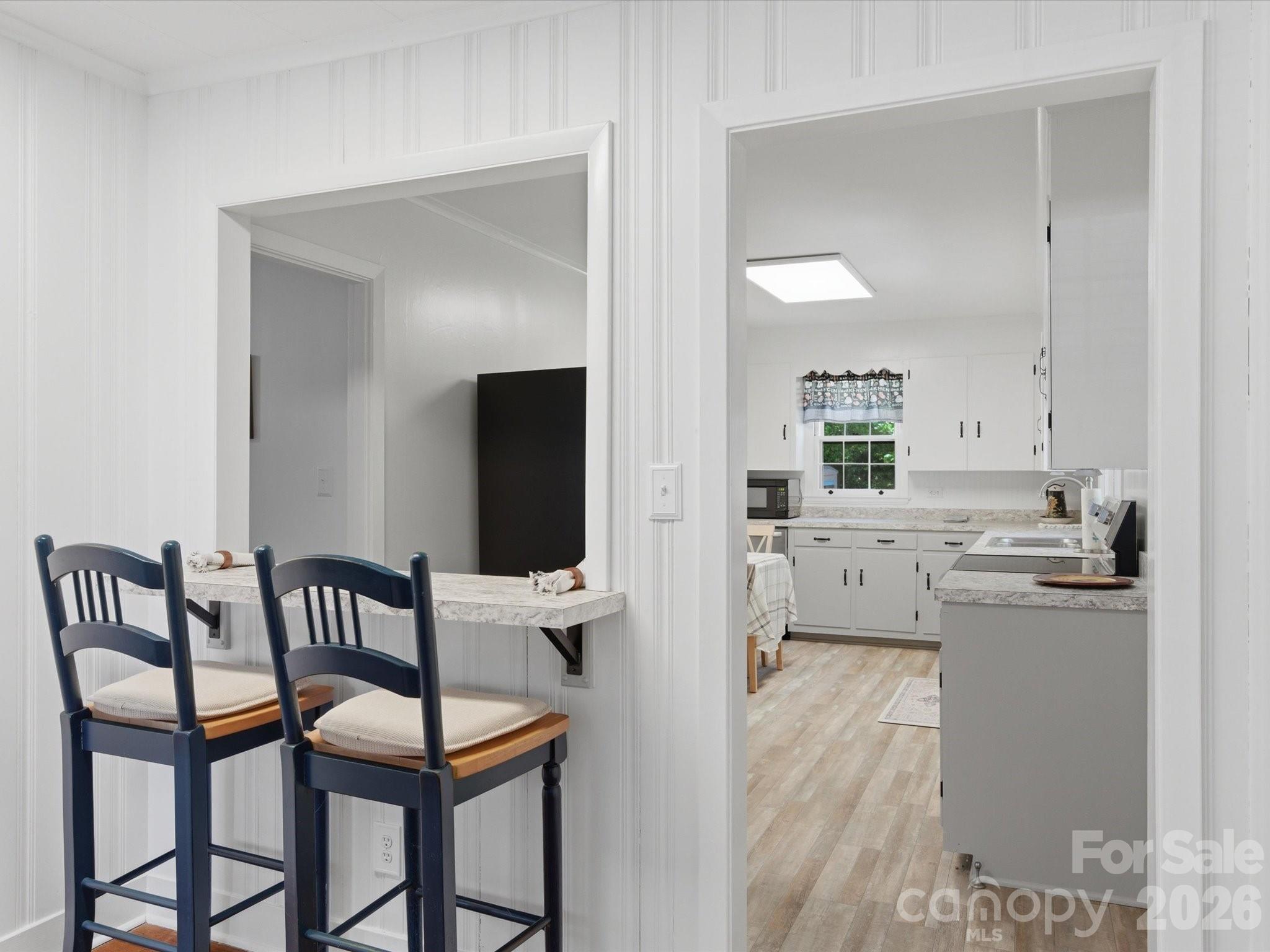 419 Knox Street Clover, SC 29710 - Photo 17 of 48 a view of a dining room with furniture and wooden floor