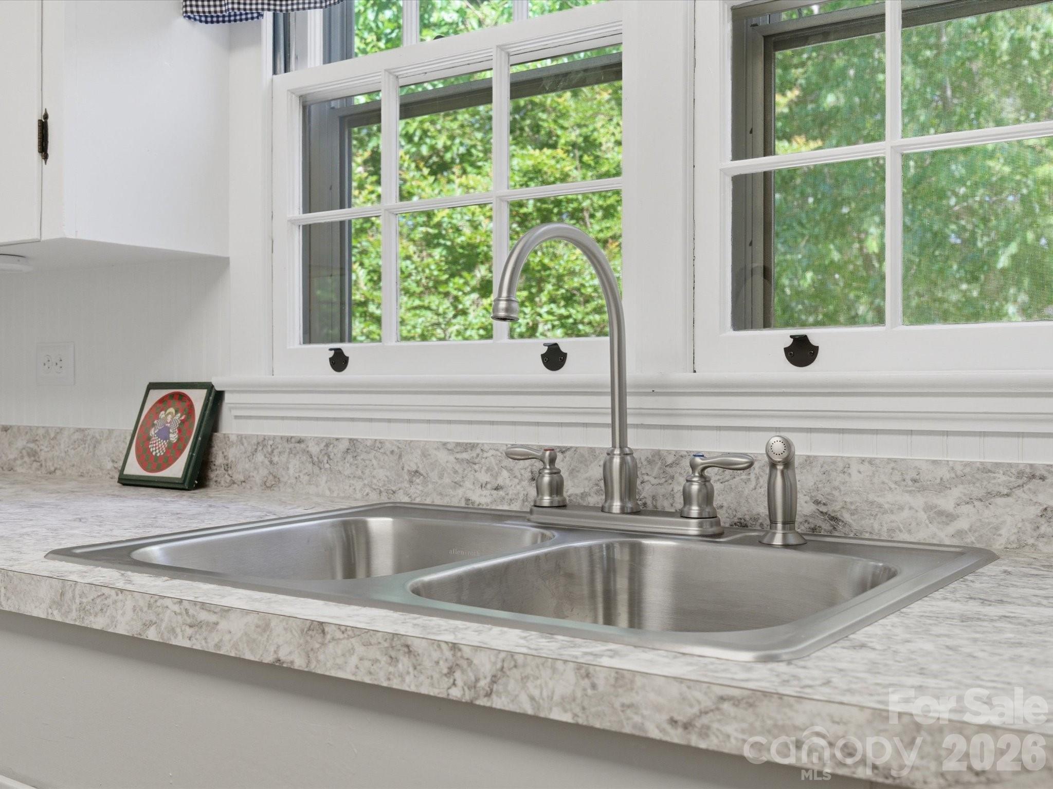 419 Knox Street Clover, SC 29710 - Photo 19 of 48 a close view of sink a faucet and appliance
