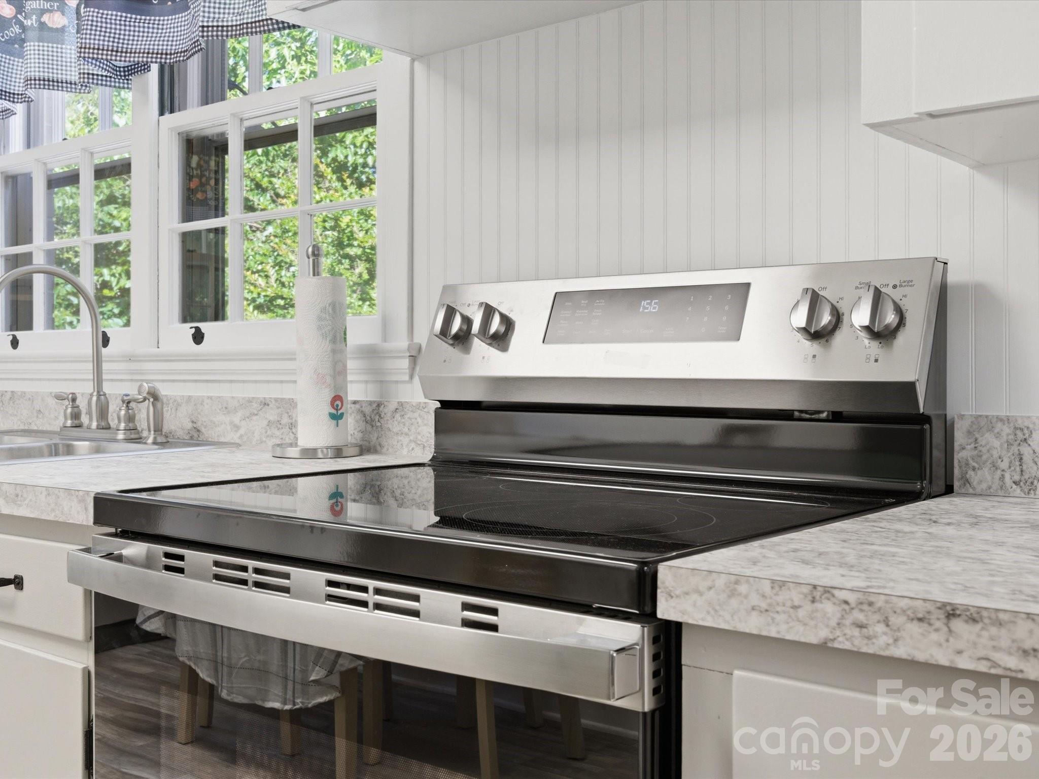 419 Knox Street Clover, SC 29710 - Photo 21 of 48 a stove top oven sitting inside of a kitchen