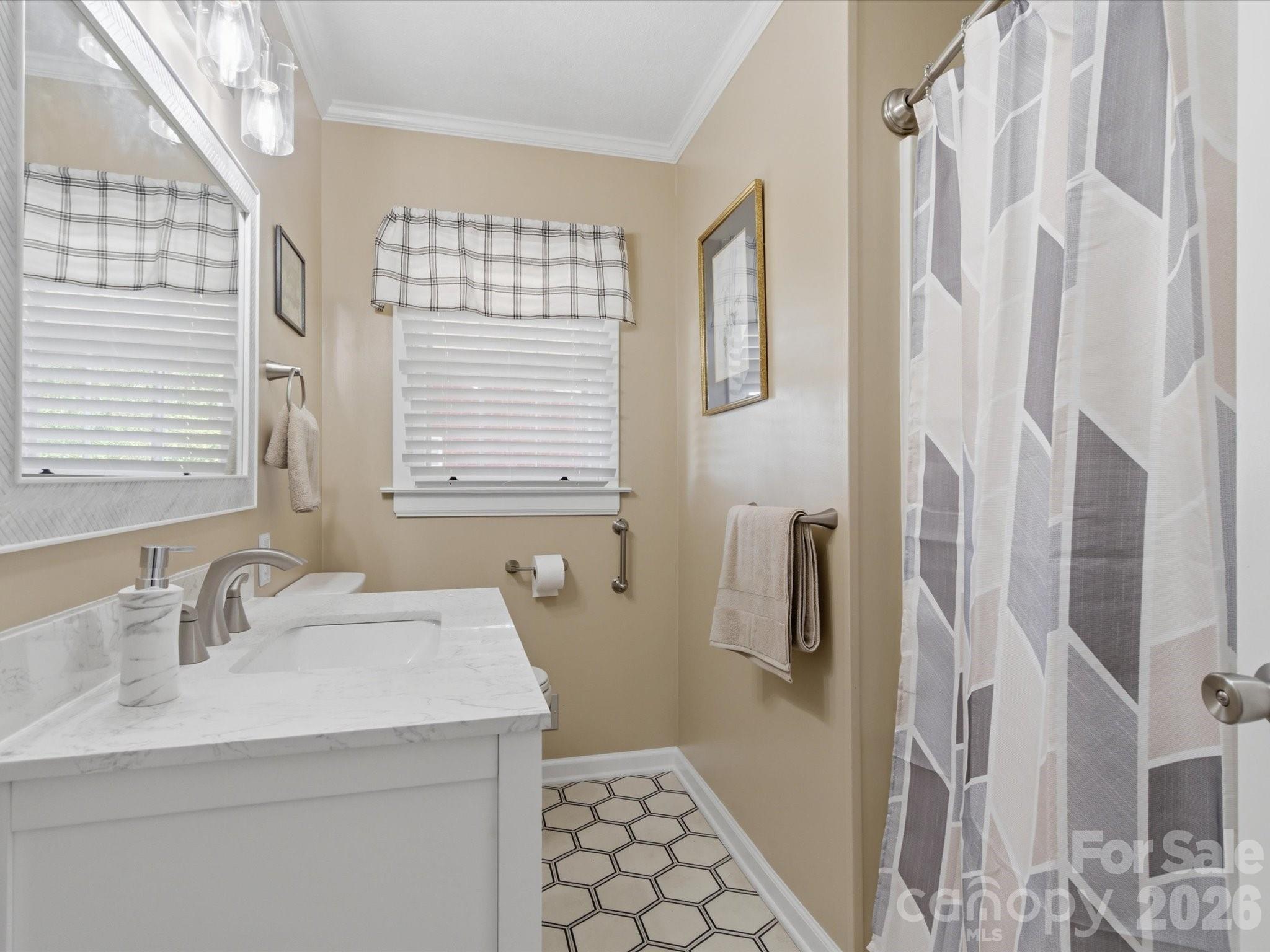 419 Knox Street Clover, SC 29710 - Photo 29 of 48 a bathroom with a sink toilet and shower