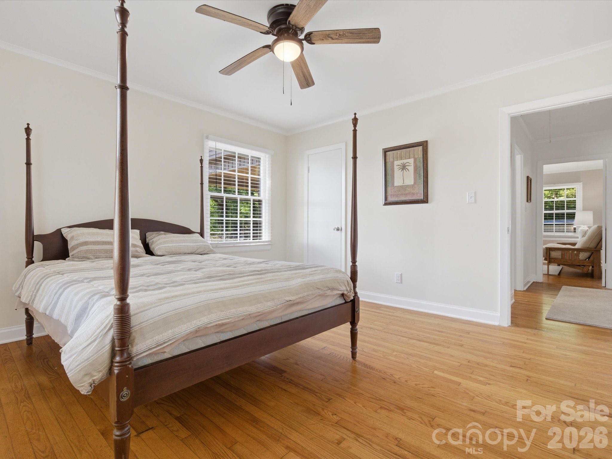 419 Knox Street Clover, SC 29710 - Photo 33 of 48 a bedroom with a bed and wooden floor