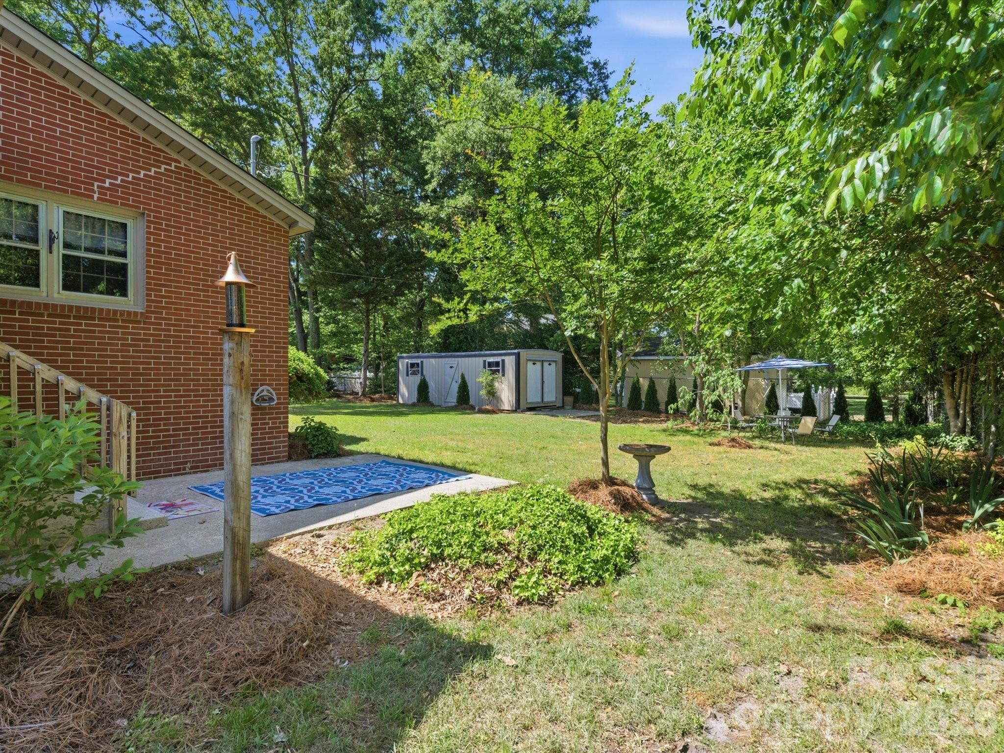 419 Knox Street Clover, SC 29710 - Photo 35 of 48 a house with lots of trees