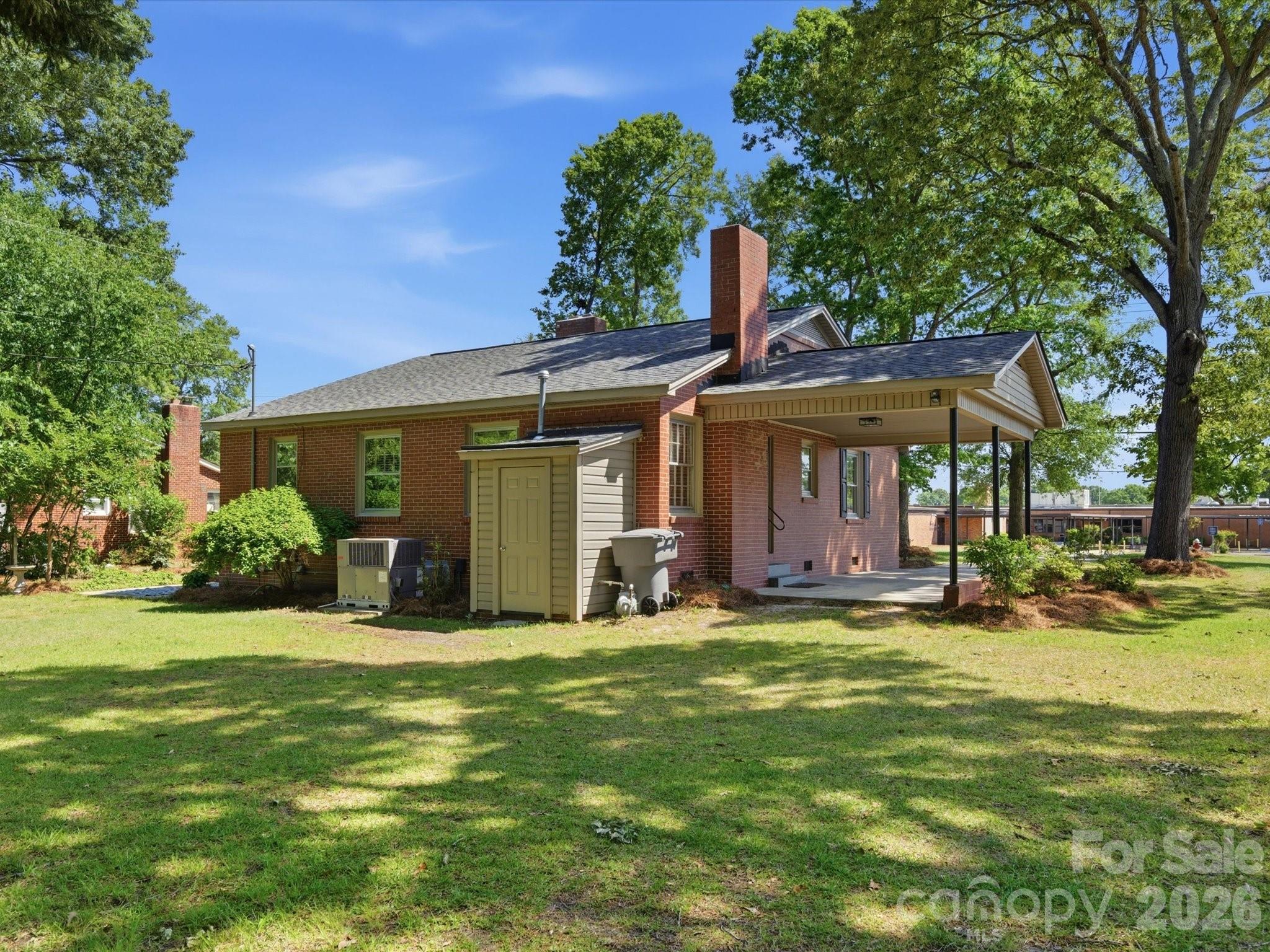 419 Knox Street Clover, SC 29710 - Photo 37 of 48 a view of a house with a yard porch and sitting area