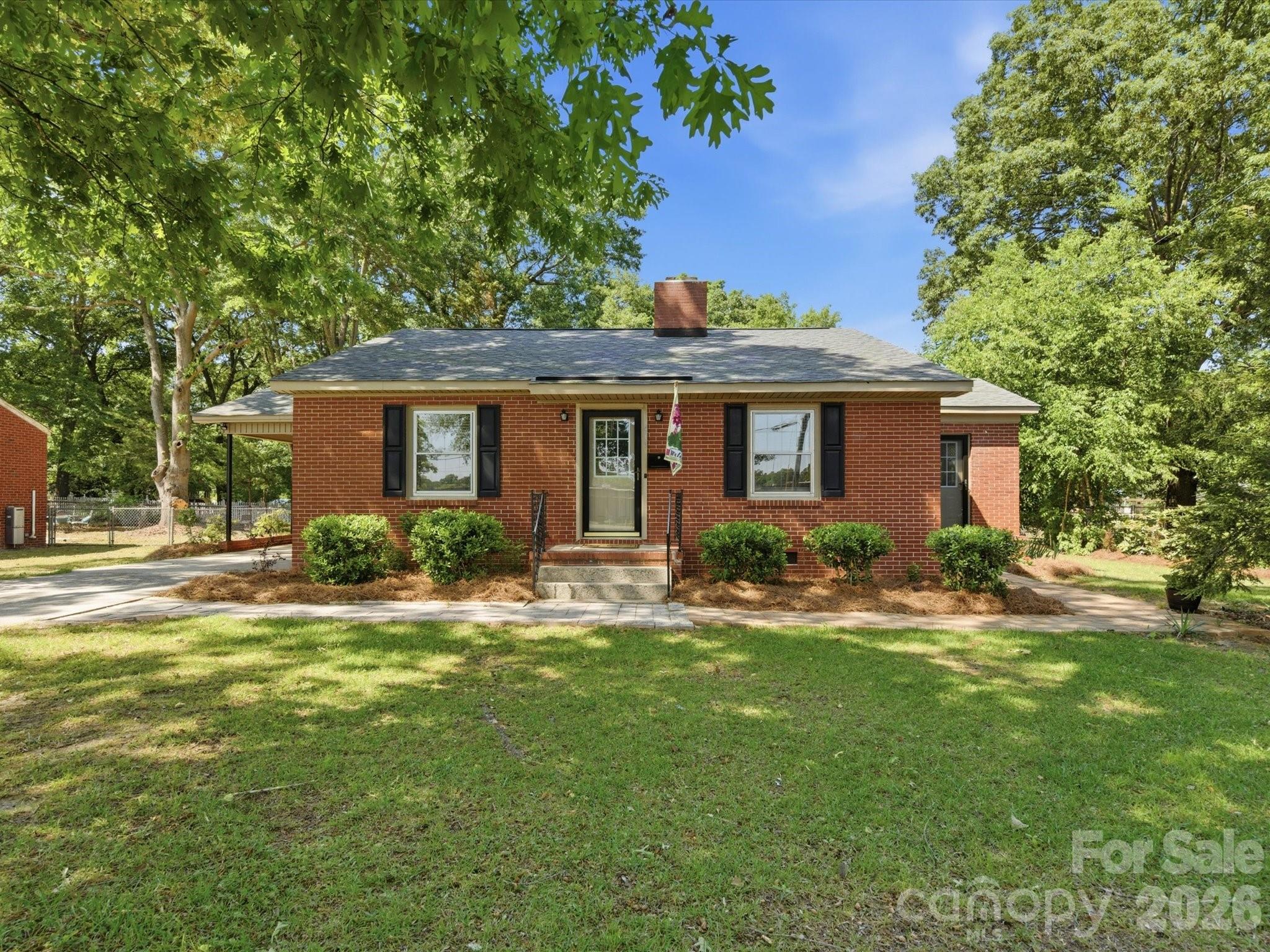 419 Knox Street Clover, SC 29710 - Photo 45 of 48 a front view of house with yard and green space