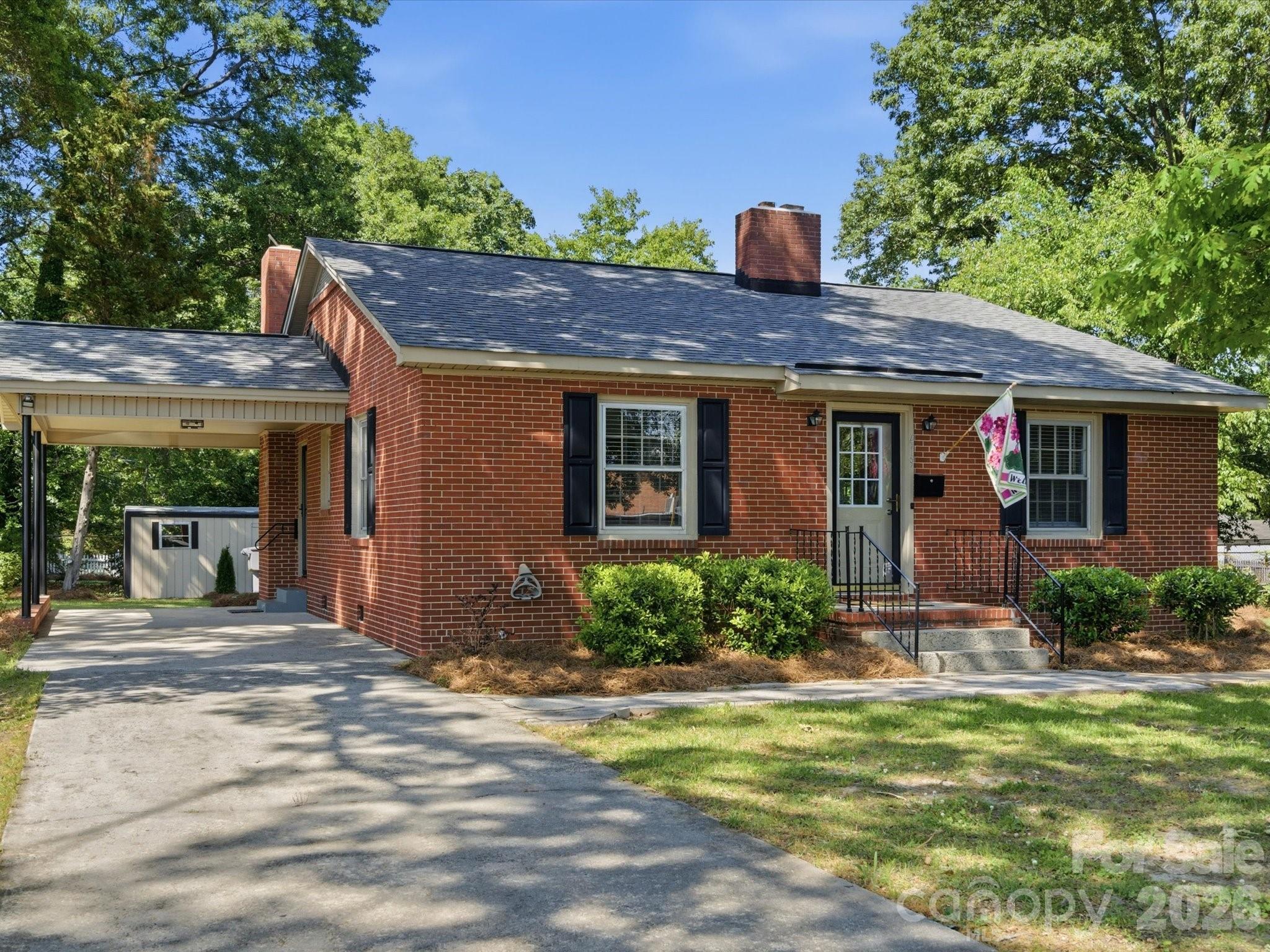 419 Knox Street Clover, SC 29710 - Photo 47 of 48 a front view of a house with garden