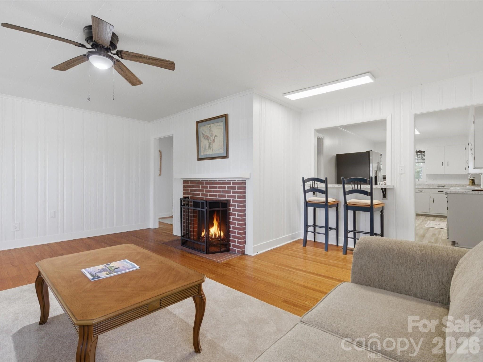 419 Knox Street Clover, SC 29710 - Photo 8 of 48 a living room with furniture and a fireplace