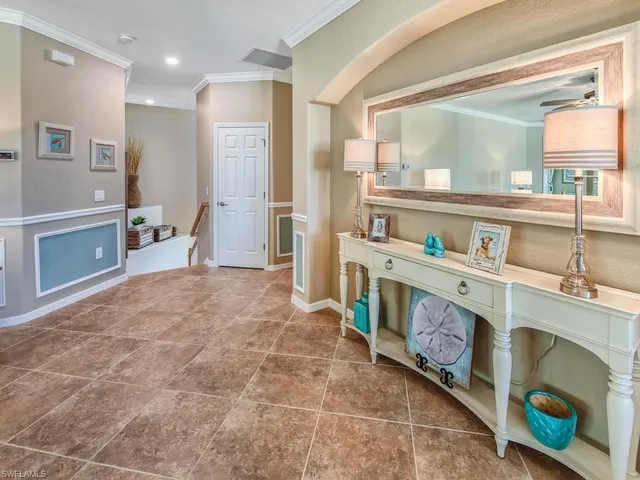 a room with furniture a washer and dryer