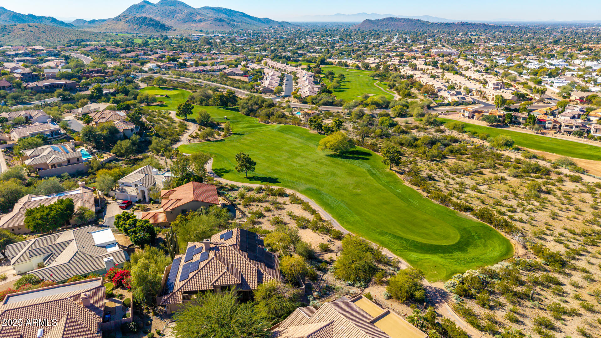 13821 16th Way, Unit 9 Phoenix, AZ 85022 - Photo 7 of 18 an aerial view of residential houses with outdoor space and trees