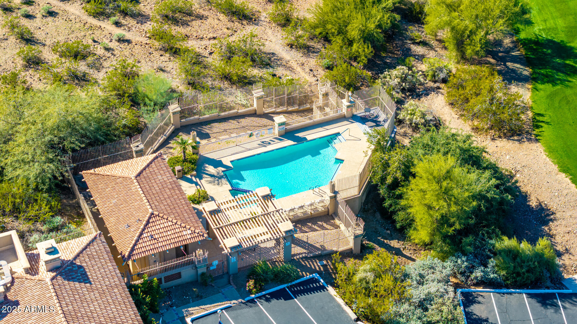 13821 16th Way, Unit 9 Phoenix, AZ 85022 - Photo 9 of 18 an aerial view of a house with a yard and swimming pool